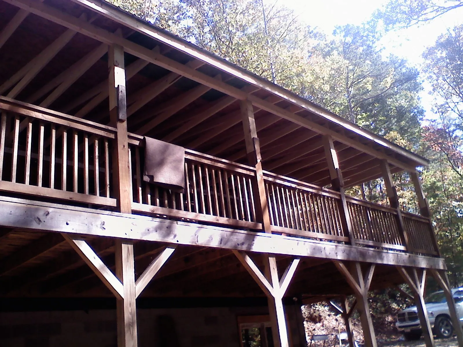 Timber framing under a new elevated porch and deck — Roof Leak Repair in Burnt Hills by Roofing Brothers